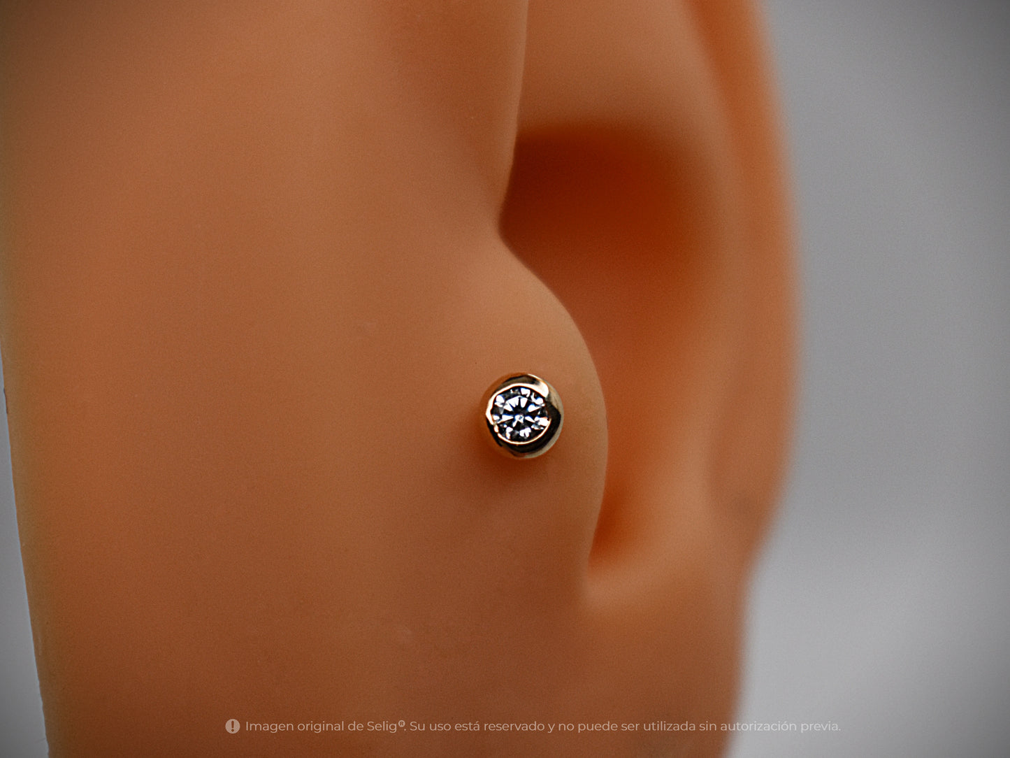 Circón 4mm - Oro 18k
