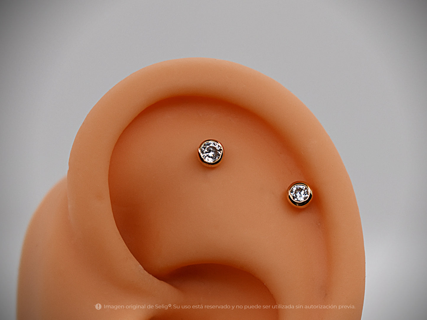 Circón 4mm - Oro 18k