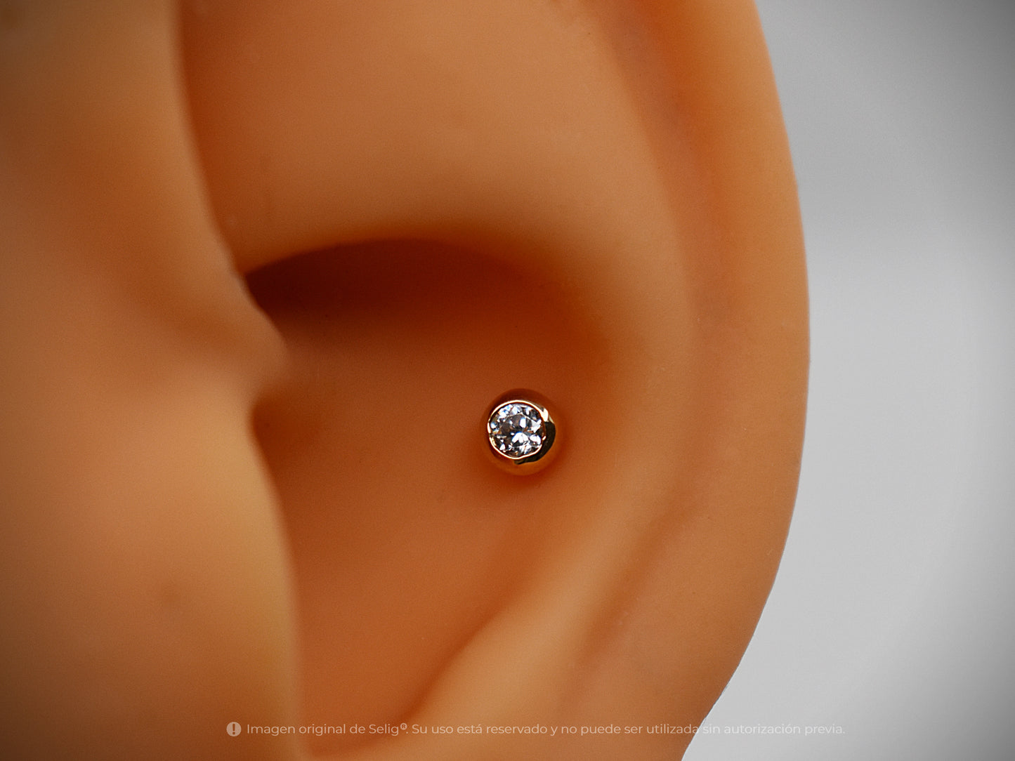 Circón 4mm - Oro 18k