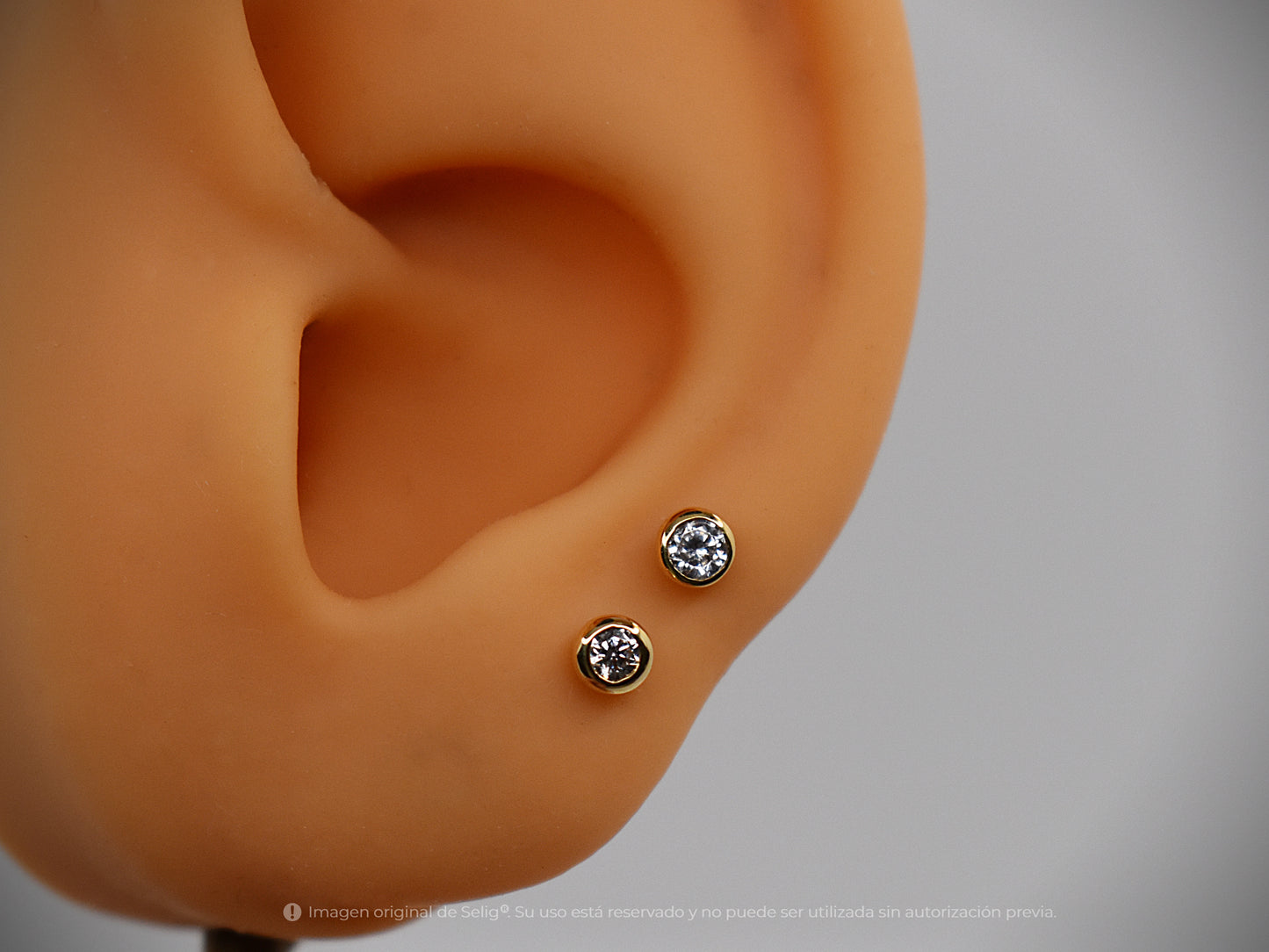 Circón 4mm - Oro 18k