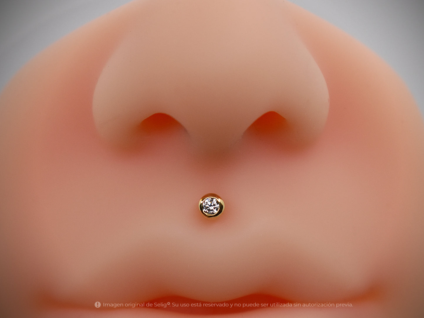 Circón 4mm - Oro 18k