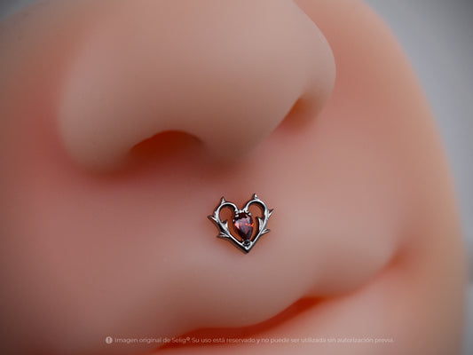 Piercing corazón rojo - medusa