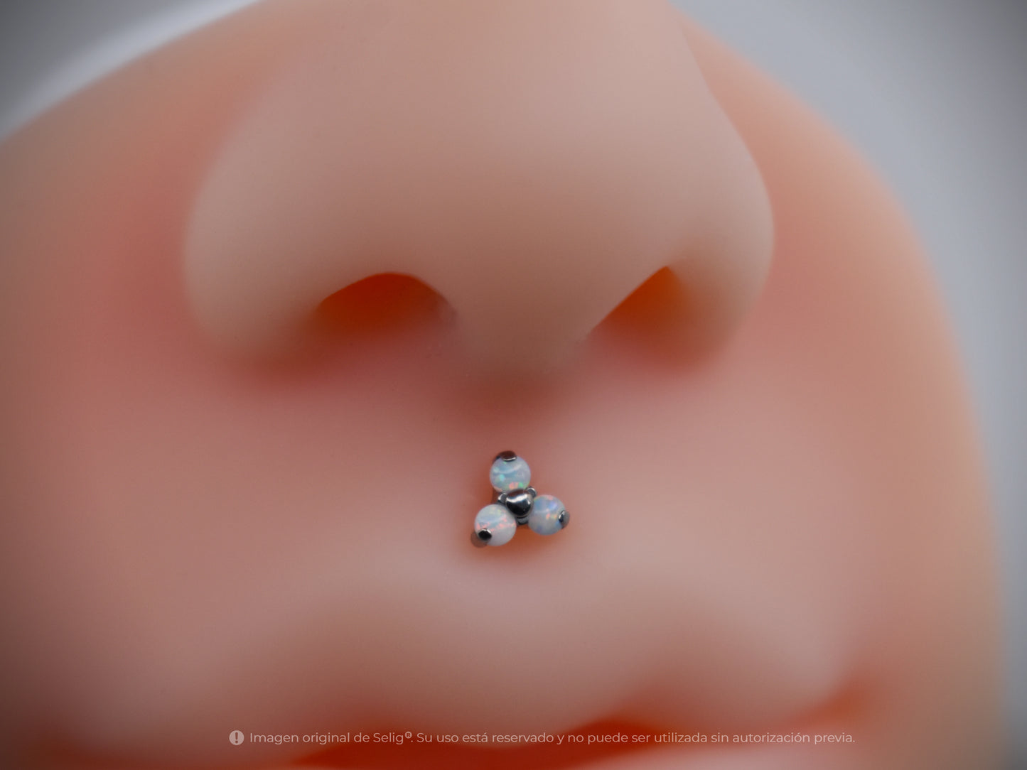Piercing trinity opalo blanco